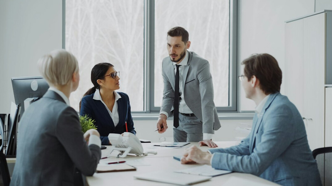 corporate executives in meeting